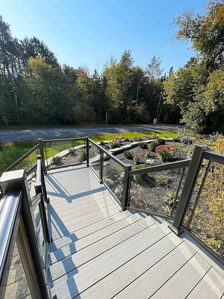 Garden steps descending toward layered planting beds