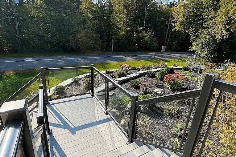 Garden steps descending toward layered planting beds