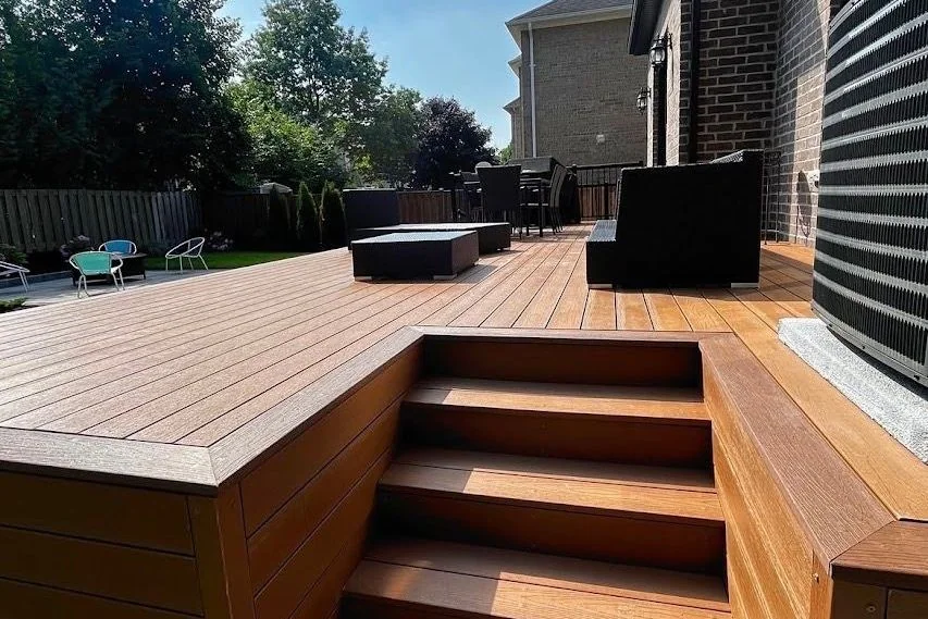 Warm composite deck with integrated steps and outdoor seating