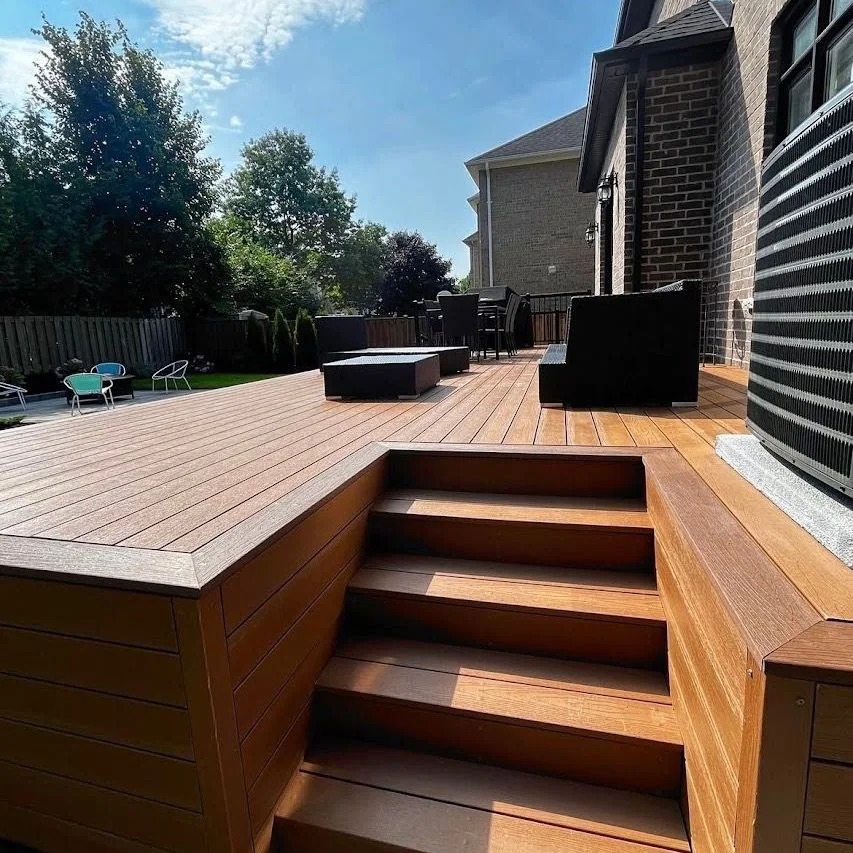 Warm composite deck with integrated steps and outdoor seating